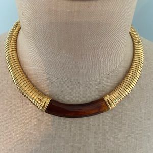 Gold collar necklace with tortoise inset